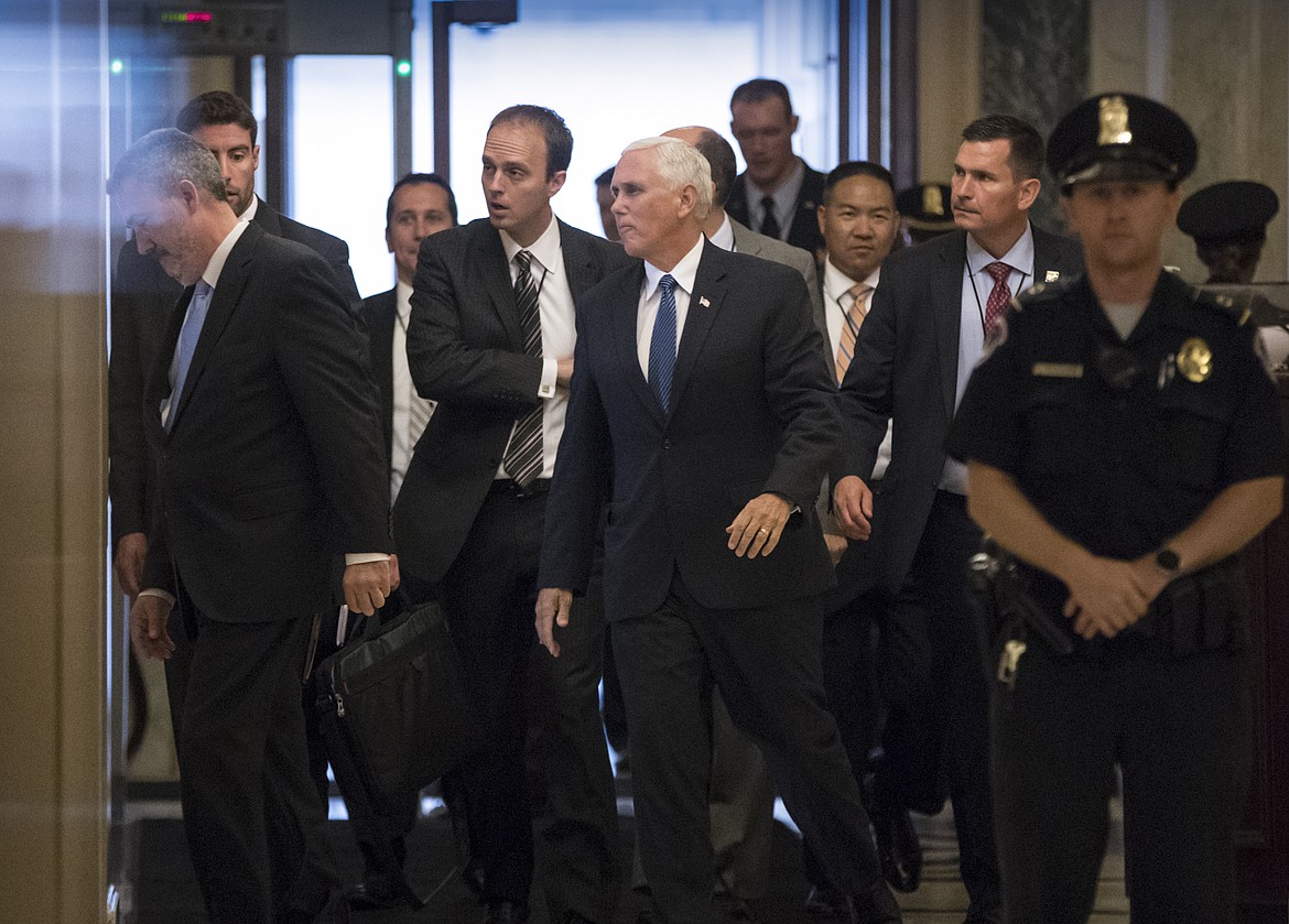 Vice President Mike Pence arrives on Capitol Hill in Washington, Thursday, July 13, 2017, to meet with lawmakers on the Republican health care bill which is under attack from within the party. (AP Photo/J. Scott Applewhite)