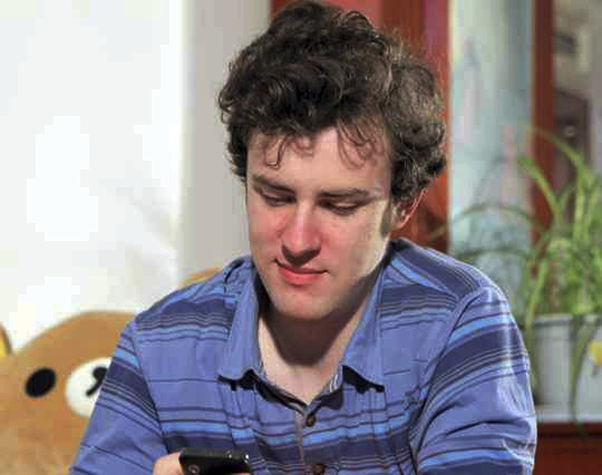 This undated photo provided by Jennifer McLean shows her son, University of Montana student Guthrie McLean, in China. Guthrie was arrested Sunday, July 16, 2017, after an June 10 altercation with a taxi driver in the city of Zhengzhou, China, and accused of intentionally injuring the taxi driver. A family friend, Tom Mitchell, says Mclean was trying to protect his mother after the driver attempted to rough her up following a fare dispute. (Jennifer McLean via AP)