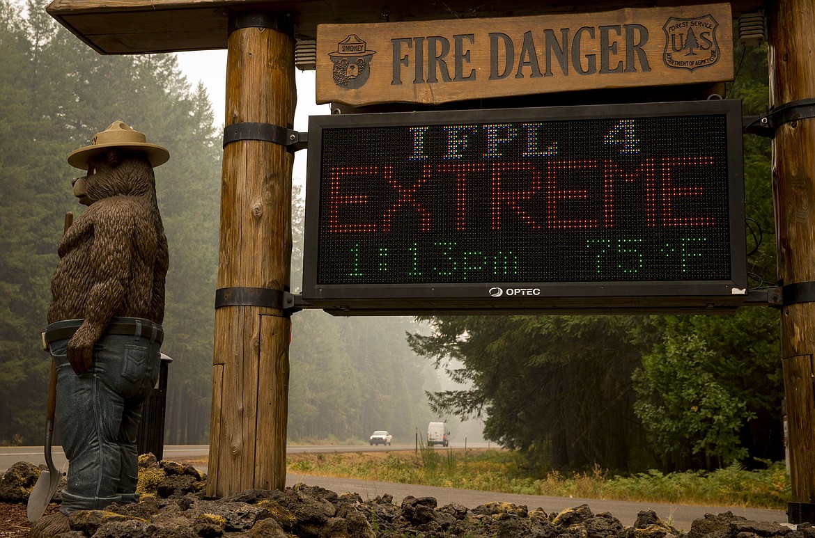 A sign board at the McKenzie River Ranger Station makes clear the fire danger level in the Willamette National Forest, Wednesday, Sept. 6, 2017 in Blue River, Ore. Several fires are burning in the area.(Andy Nelson/The Register-Guard via AP)