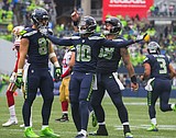 Wilson's escape act helps Seahawks top 49ers 12-9