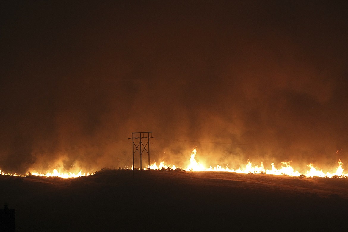 (Joe Jaszewski/Idaho Statesman via AP, File)
In this June 30, 2016 file photo a wildfire fire burns near Table Rock in Boise, Idaho. The U.S. Forest Service and Idaho have forged agreements leading to more logging on federal land in what officials said could become a template for other Western states and reduce the severity of wildfires.