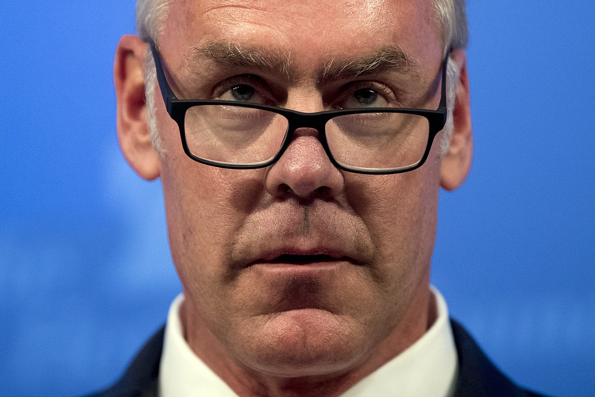 Interior Secretary Ryan Zinke speaks on the Trump Administration's energy policy at the Heritage Foundation in Washington, Friday, Sept. 29, 2017. (AP Photo/Andrew Harnik)