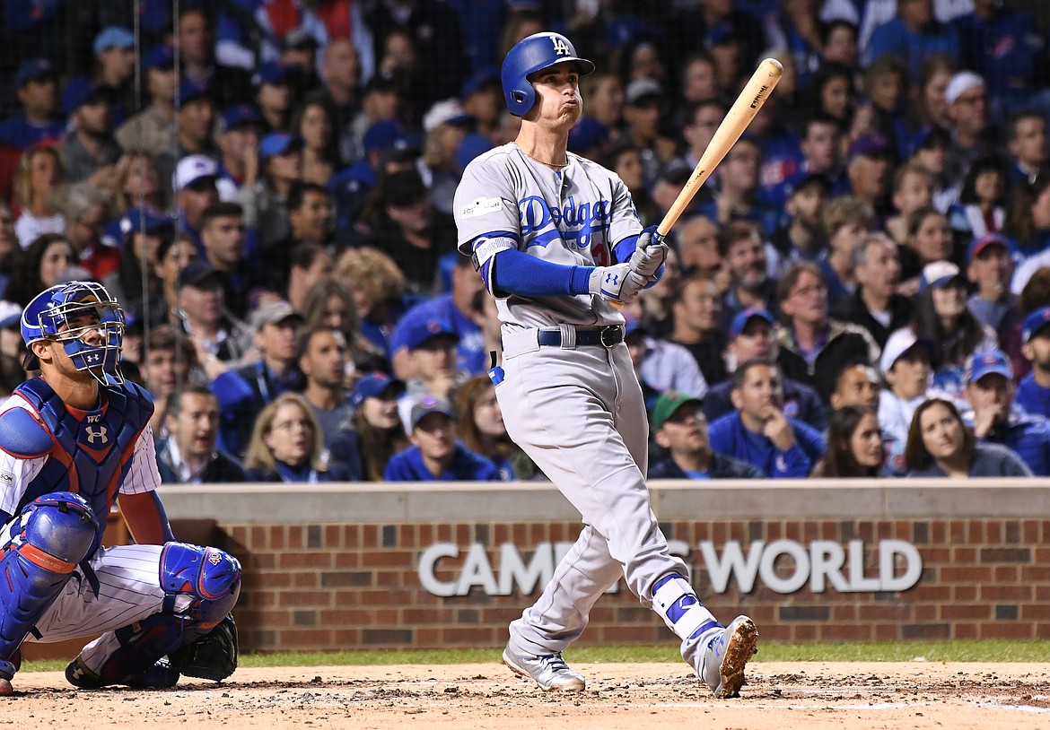 The Los Angeles Dodgers' Cody Bellinger hots a solo home run against the Chicago Cubs in the third inning during Game 4 of the National League Championship Series at Wrigley Field in Chicago on Wednesday, Oct. 18, 2017. (Wally Skalij/Los Angeles Times/TNS)