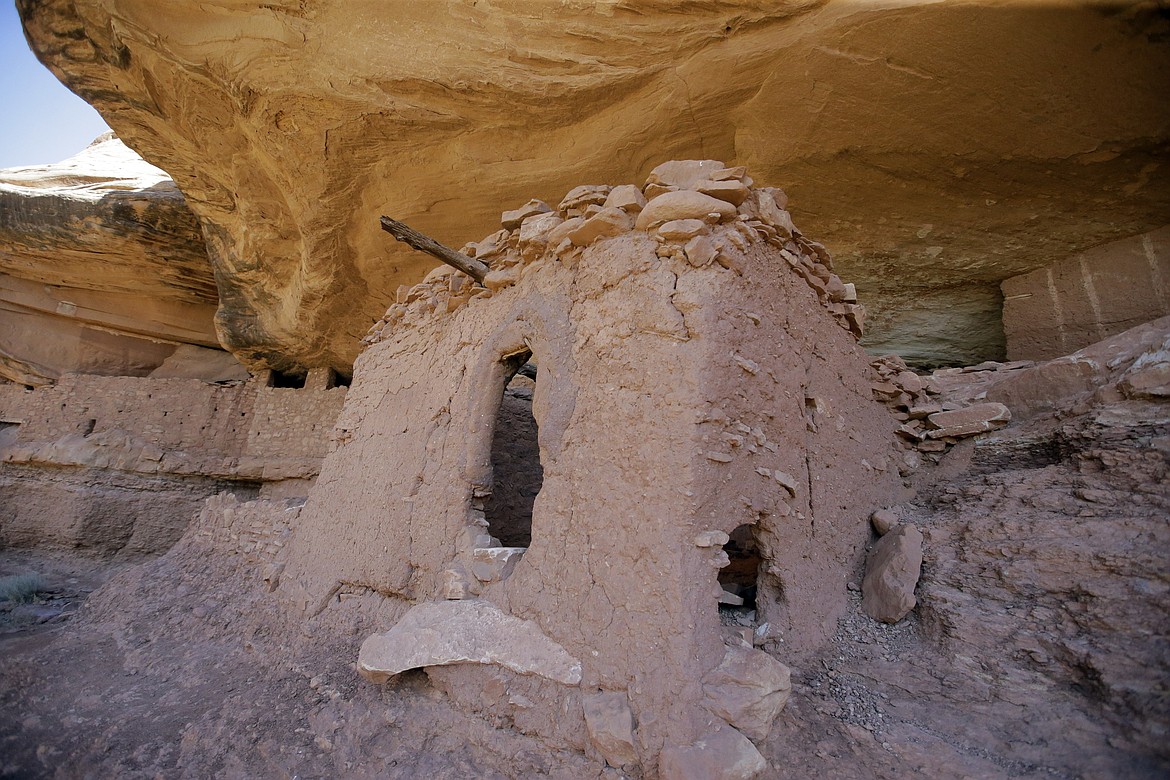 FILE - This July 15, 2016, file photo, shows the &#147;Moonhouse&#148; in McLoyd Canyon which is part of Bears Ears National Monument, near Blanding, Utah. President Donald Trump&#146;s rare move to shrink two large national monuments in Utah triggered another round of outrage among Native American leaders who vowed to unite and take the fight to court to preserve protections for lands they consider sacred. Trump decided to reduce Bears Ears &#151; created last December by President Barack Obama &#151; by about 85 percent and Grand Staircase-Escalante &#151; designated in 1996 by President Bill Clinton &#151; by nearly half. (AP Photo/Rick Bowmer, File)