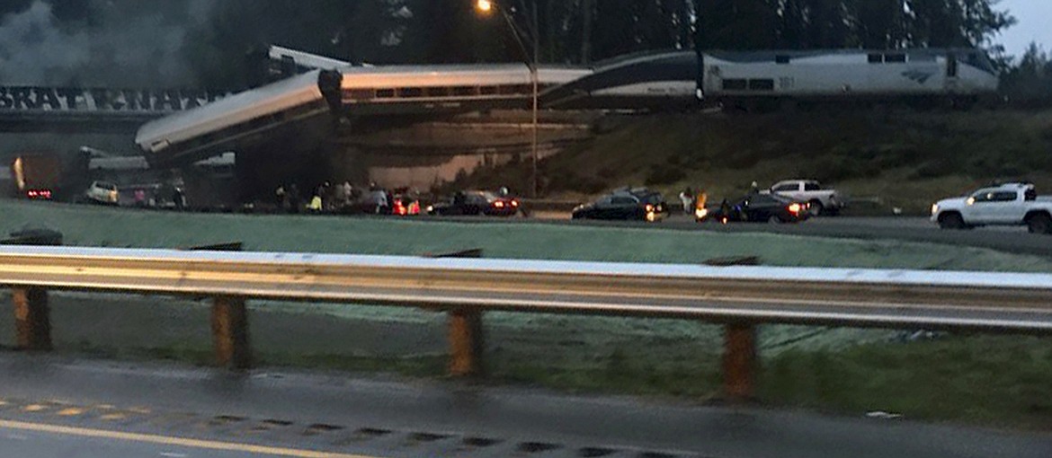 This photo provided by Danae Orlob shows an Amtrak train that derailed south of Seattle on Monday, Dec. 18, 2017. Authorities reported &#147;injuries and casualties.&#148; The train derailed about 40 miles (64 kilometers) south of Seattle before 8 a.m., spilling at least one train car on to busy Interstate 5. (Danae Orlob via AP)