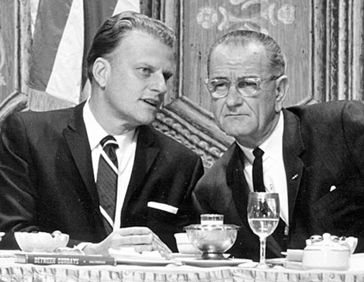 Billy Graham with President Lyndon B. Johnson in an undated photo. (Graham archive/TNS)