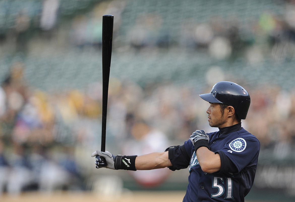 Ichiro in throwback Mariners uniform  Mariners baseball, Seattle mariners  baseball, Ichiro suzuki