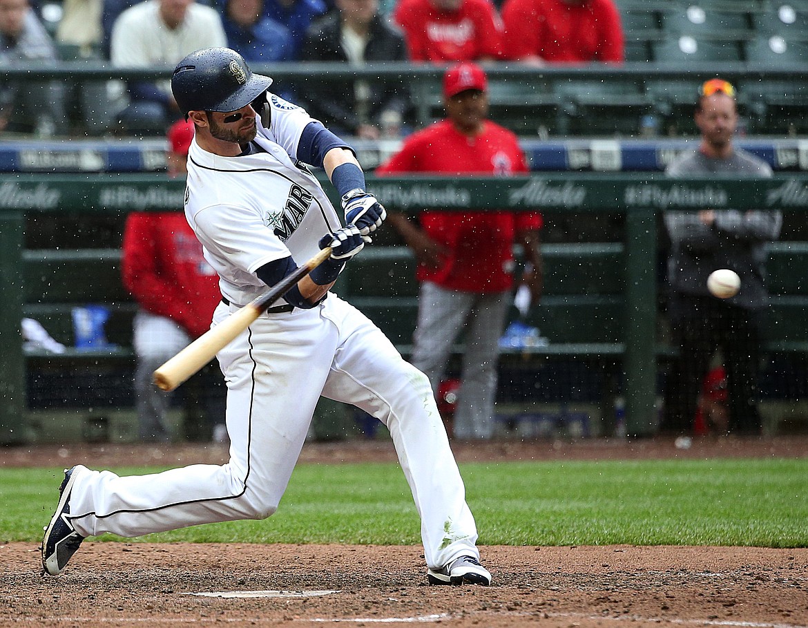 The Seattle Mariners' Mitch Haniger connects for a walkoff two-run home run against the Los Angeles Angels on Wednesday, June 13, 2018, at Safeco Field in Seattle. The Mariners won, 8-6. (Ken Lambert/Seattle Times/TNS)