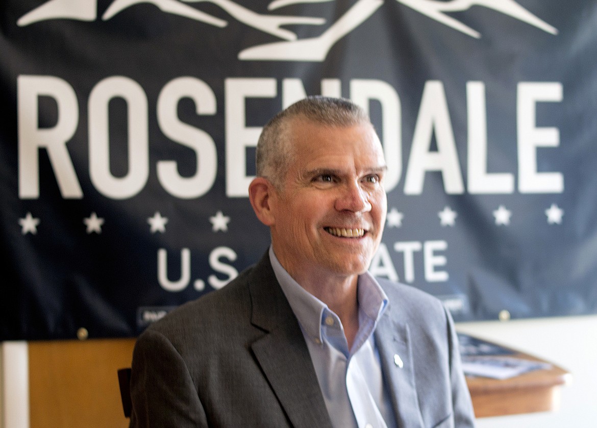 FILE - In this July 31, 2017 file photo, Montana state Auditor Matt Rosendale awaits an interview with a reporter in Helena, Mont., as he announces his bid for the U.S. Senate. U.S. Sen. Jon Tester is giving President Donald Trump a tongue-in-cheek welcome to Montana by taking out a full-page ad in 14 newspapers thanking the president for signing 16 bills that the Democrat sponsored or co-sponsored. Trump was scheduled to hold a rally Thursday, July 5, 2018, in Great Falls to campaign for Tester&#146;s Republican challenger, Rosendale. The president has made the Montana Senate race a priority after he blamed Tester for derailing the nomination of his first Veterans Affairs nominee, White House physician Ronny Jackson. (AP Photo/Bobby Caina Calvan, File)