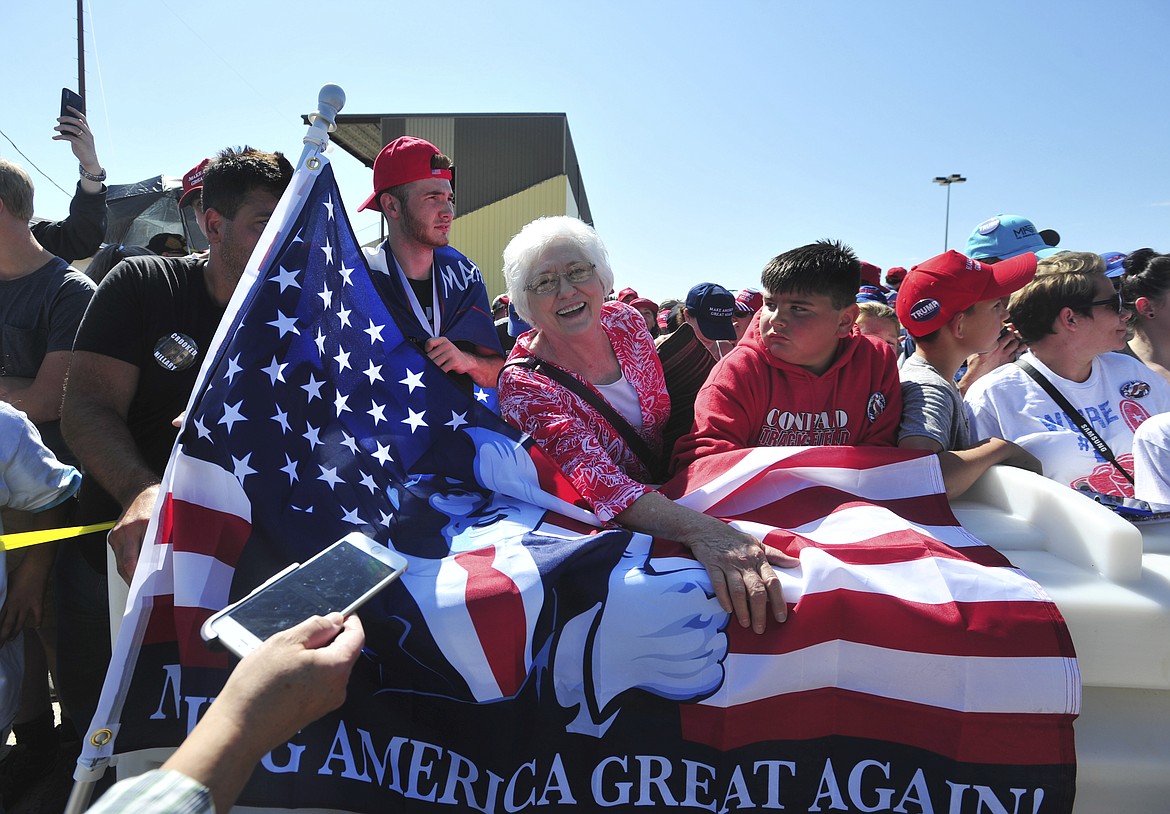 A line forms outside of the Four Seasons Arena for President Donald Trump's campaign rally, Thursday, July 5, 2018 in Great Falls, Mont. (Rion Sanders/The Great Falls Tribune via AP)