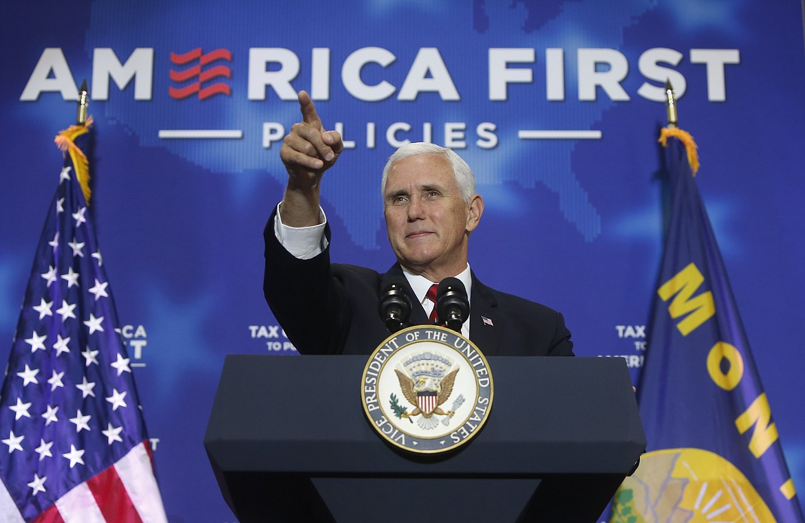 Vice President Mike Pence speaks during the America First Policies event at MetraPark's Montana Pavilion Wednesday, July 25, 2018 in Billings, Mont. Pence touted the Trump administration's accomplishments Wednesday and called Democratic U.S. Sen. Jon Tester an obstructionist while supporting his challenger Matt Rosendale. (Bethany Baker/The Billings Gazette via AP)