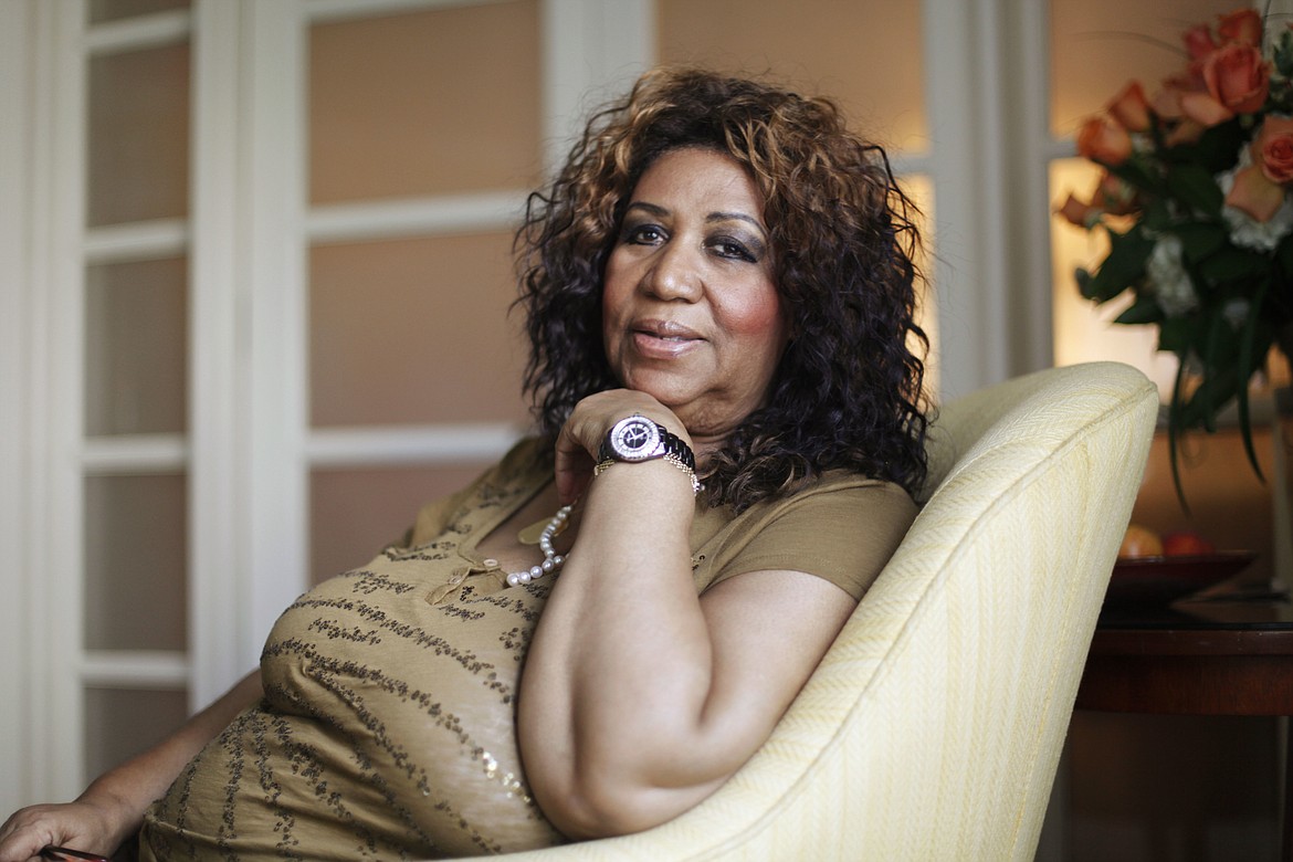 FILE - In this July 26, 2010 file photo, soul singer Aretha Franklin poses for a portrait in Philadelphia.   Franklin died Thursday, Aug. 16, 2018 at her home in Detroit.  She was 76.   (AP Photo/Matt Rourke, File)