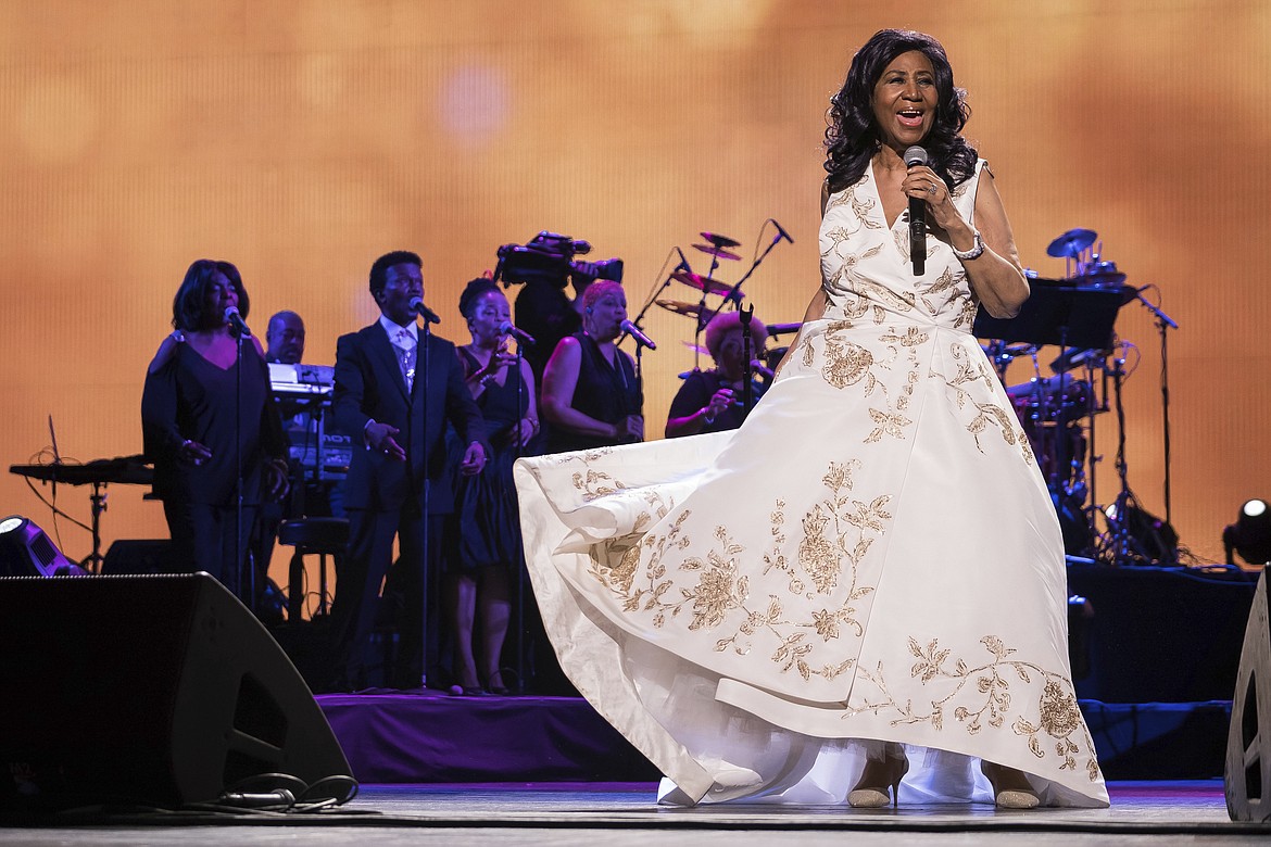 FILE - In this April 19, 2017, file photo, Aretha Franklin performs at the world premiere of &quot;Clive Davis: The Soundtrack of Our Lives&quot; at Radio City Music Hall, during the 2017 Tribeca Film Festival, in New York. Franklin died Thursday, Aug. 16, 2018, at her home in Detroit.  She was 76. (Photo by Charles Sykes/Invision/AP, File)