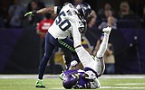 Wright has knee surgery, status for Seattle's opener unknown