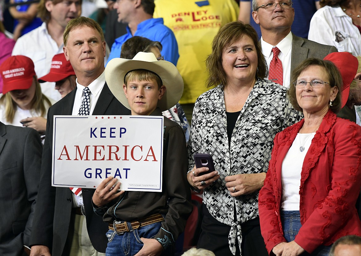 People wait for President Donald Trump to arrive and speak at a rally in Billings, Mont., Thursday, Sept. 6, 2018.(AP Photo/Susan Walsh)