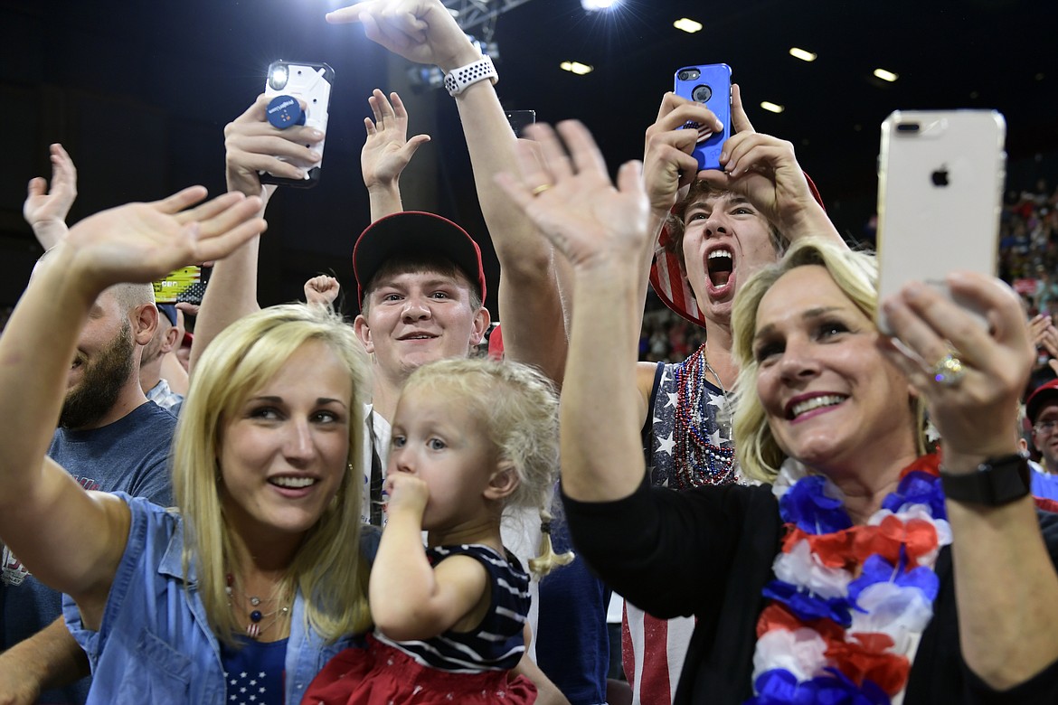 People respond as President Donald Trump arrives to speak at a rally in Billings, Mont., Thursday, Sept. 6, 2018.(AP Photo/Susan Walsh)