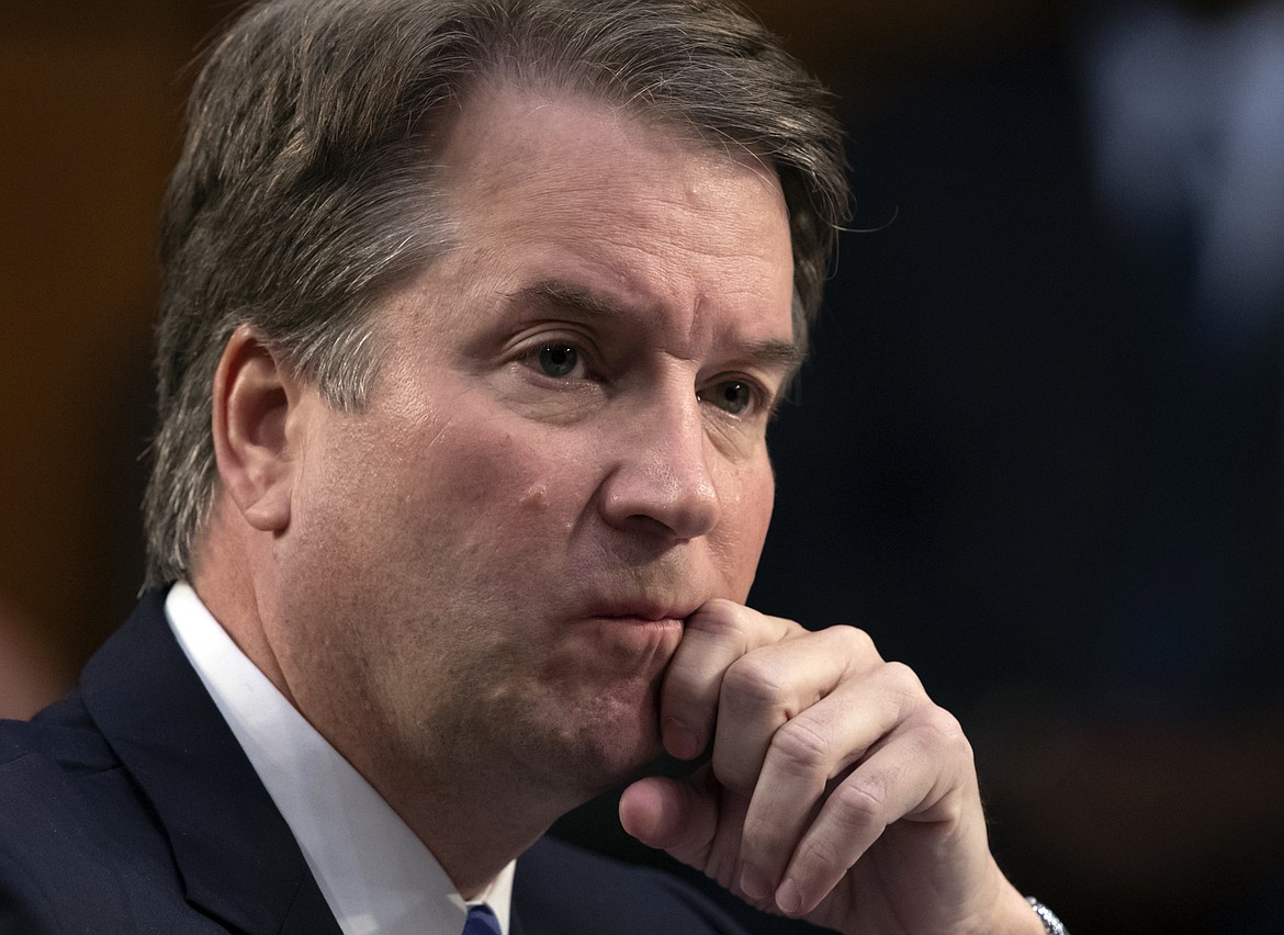 FILE - In this Sept. 6, 2018, file photo, after more than an hour of delay over procedural questions, President Donald Trump&#146;s Supreme Court nominee Brett Kavanaugh waits to testify before the Senate Judiciary Committee for the third day of his confirmation hearing, on Capitol Hill in Washington. Christine Blasey Ford, the woman accusing Kavanaugh of sexual misconduct when they were teenagers has come forward to The Washington Post.  (AP Photo/J. Scott Applewhite, File)