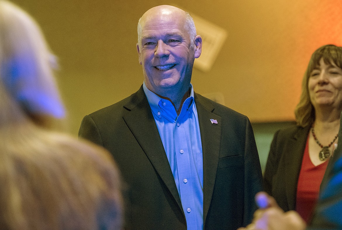 U.S. Rep. Greg Gianforte speaks with supporters as the results come in at the Hilton Garden Inn Tuesday, Nov. 6, 2018, in Bozeman, Mont. Gianforte has a lead over Democratic challenger Kathleen Williams, but Montana&#146;s U.S. House race is too close to call with votes left to be counted. (Rachel Leathe/Bozeman Daily Chronicle via AP)