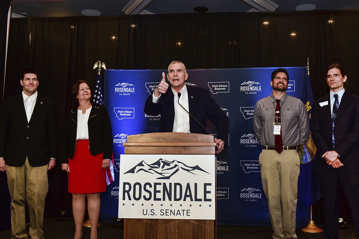 Senate candidate Matt Rosendale greet supporters at the Delta Hotel along with his family from left Matthew, Jean, Brien and Adam Rosendale, on Tuesday, Nov. 6, 2018, in Helena, Mont., to say it will be a long night and results will be slow to come in. Rosendale is running against Sen. Jon Tester, D-Mont. (AP Photo/Eliza Wiley)