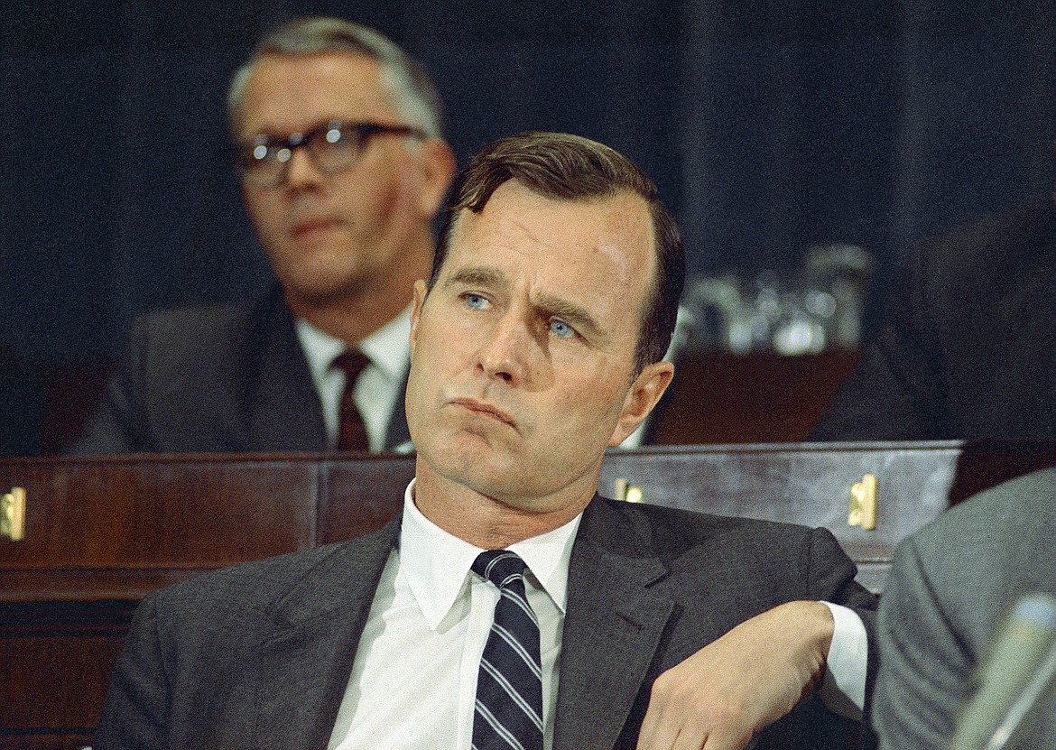 FILE - In this March 6, 1968 file photo, George H.W. Bush, R-Texas, appears in Washington. Bush died at the age of 94 on Friday, Nov. 30, 2018, about eight months after the death of his wife, Barbara Bush. (AP Photo/Charles Tasnadi, File)