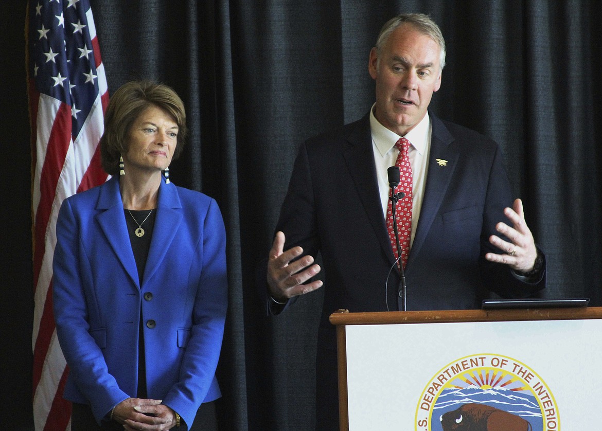 FILE--In this May 31, 2017, file photo, Interior Secretary Ryan Zinke, right, with U.S. Sen. Lisa Murkowski, R-Alaska, speaks during a news conference in Anchorage, Alaska.  (AP Photo/Mark Thiessen, file)