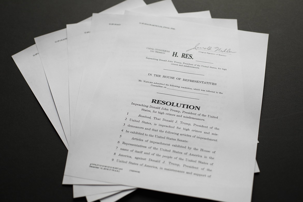 The articles of impeachment against President Donald Trump photographed on Dec. 10, 2019 in Washington. (AP Photo/Pablo Martinez Monsivais)