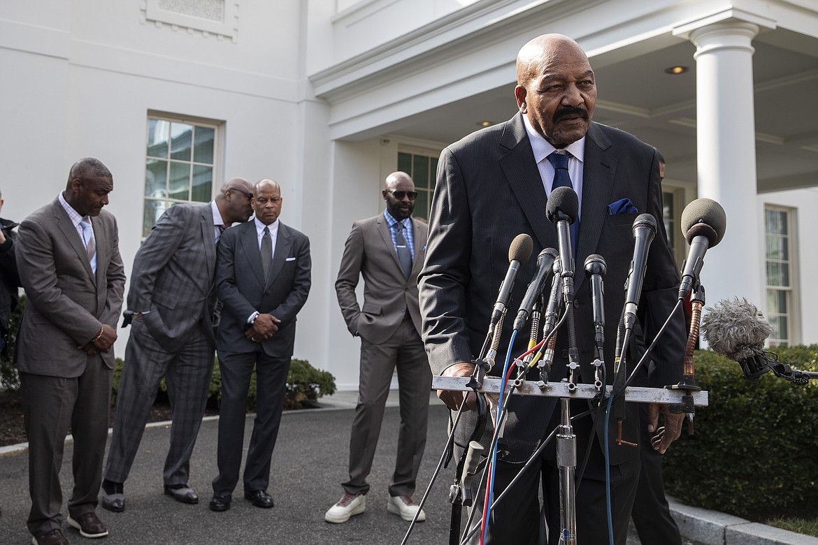 Former NFL football player Jim Brown speaks after walking out of the West Wing of White House, Tuesday, Feb. 18, 2020, in Washington. It was announced that President Donald Trump has granted a full pardon to Edward DeBartolo Jr., former owner of the San Francisco 49ers NFL football team convicted in gambling fraud scandal. (AP Photo/Alex Brandon)