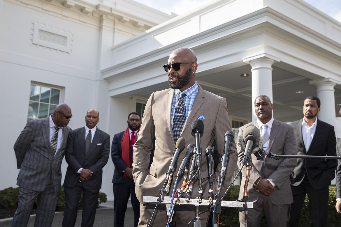 Former NFL football player Jerry Rice speaks after walking out of the West Wing of White House, Tuesday, Feb. 18, 2020, in Washington. It was announced that President Donald Trump has granted a full pardon to Edward DeBartolo Jr., former owner of the San Francisco 49ers NFL football team convicted in gambling fraud scandal. (AP Photo/Alex Brandon)