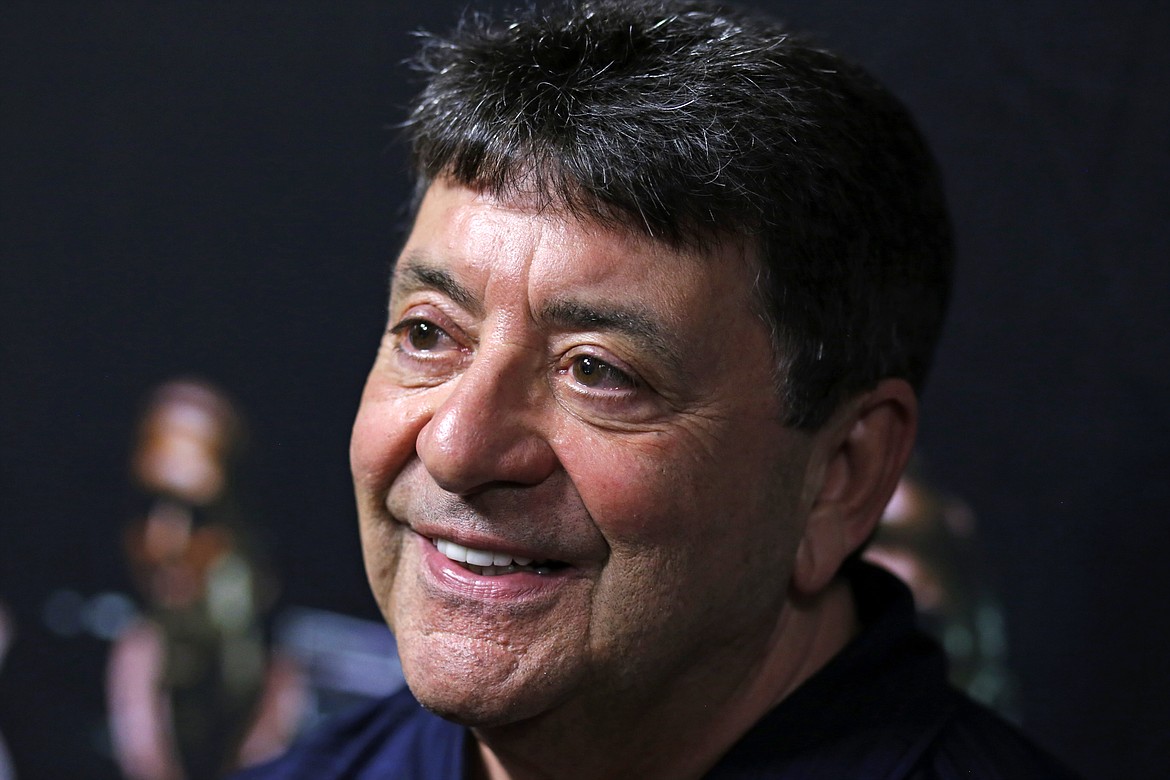 FILE - In this Aug. 5, 2016, file photo Pro Football Hall of Fame 2016 inductee Edward J. DeBartolo, Jr., talks with reporters in Canton, Ohio. President Donald Trump pardoned DeBartolo, former San Francisco 49ers owner convicted in gambling fraud scandal. (AP Photo/Gene J. Puskar, File)