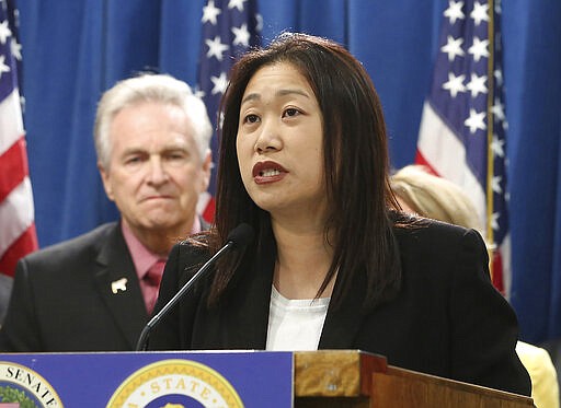 FILE - In this March 9, 2015 file photo state Sen. Janet Nguyen, R-Garden Grove, speaks at a news conference in Sacramento, Calif. California voters are picking through 101 legislative contests Tuesday, from a battle between two Democratic dynasties to nasty infighting among outnumbered Republicans. The top two vote-getters will move on to the November general election, regardless of party affiliation. (AP Photo/Rich Pedroncelli, File)