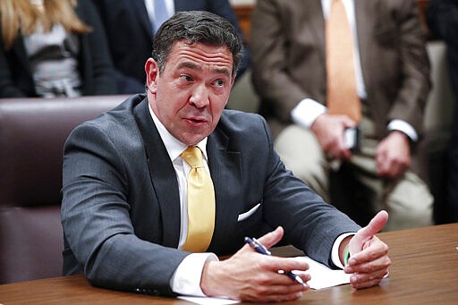 Sen. Chris McDaniel, R-Ellisville, asks for a clarification from Secretary of State Michael Watson, unseen, about legislation dealing with voters' proof of U.S. citizenship, during a meeting of the Senate Accountability, Efficiency and Transparency Committee at the Capitol in Jackson, Miss., Tuesday, March 3, 2020. (AP Photo/Rogelio V. Solis)