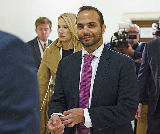 FILE - In this Oct. 25, 2018, file photo, George Papadopoulos, the former Trump campaign adviser who triggered the Russia investigation, arrives for his first appearance before congressional investigators on Capitol Hill in Washington. The Republican is running for California's 25th Congressional District seat. An ex-congressman, a state lawmaker, an online news personality and a former combat pilot are among the candidates hoping to fill a U.S. House seat north of Los Angeles &#151; a race that's being watched nationally for hints about which party might control Congress next year. (AP Photo/Carolyn Kaster, File)