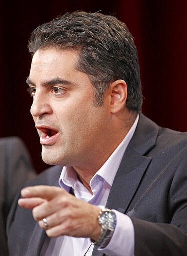 FILE - This Jan. 13, 2012 file photo shows Cenk Uygur, host of the television show &quot;The Young Turks with Cenk Uygur,&quot; at the Television Critics Association Winter Press Tour in Pasadena, Calif. California is one of the most heavily Democratic states in the country, but Republicans this year are determined to regain a string of U.S. House seats the party lost to Democrats two years ago. President Donald Trump, who wants the House back under GOP control and House Speaker Nancy Pelosi demoted, has said that with hard work Republicans &quot;can pick up seven seats in the state of California.&quot;(AP Photo/Danny Moloshok, File)