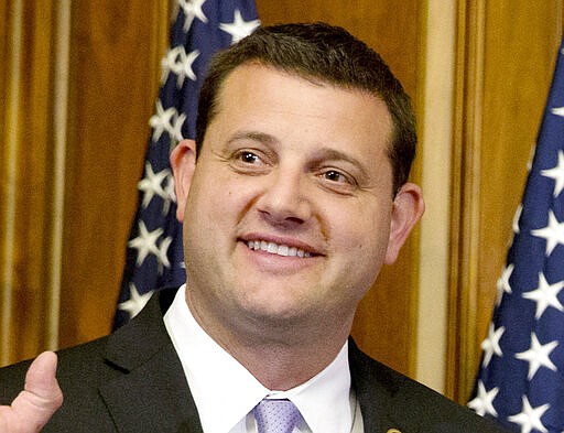 FILE - In this Jan. 6, 2015 file photo, then-Rep. David Valadao, R-Calif., poses during a ceremonial re-enactment of his swearing-in ceremony in the Rayburn Room on Capitol Hill in Washington.California is one of the most heavily Democratic states in the country, but Republicans this year are determined to regain a string of U.S. House seats the party lost to Democrats two years ago. President Donald Trump, who wants the House back under GOP control and House Speaker Nancy Pelosi demoted, has said that with hard work Republicans &quot;can pick up seven seats in the state of California.&quot; (AP Photo/Jacquelyn Martin, File)