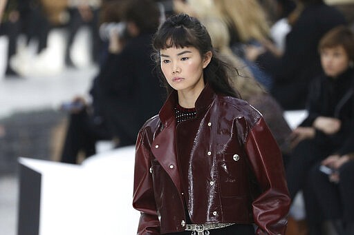Vuitton stages style history wall, Chanel goes pared-down