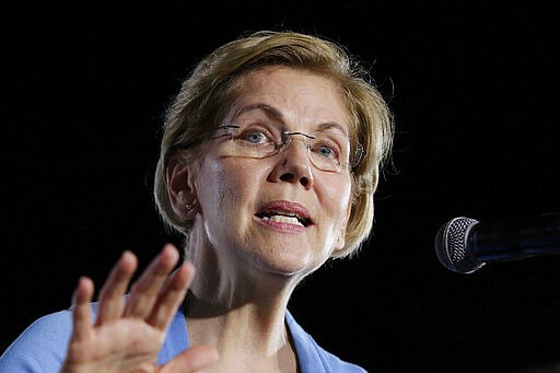 FILE - In this Thursday, Feb. 29, 2020, file photo, Democratic presidential candidate Sen. Elizabeth Warren, D-Mass., speaks to supporters during a town hall at Discovery Green in Houston. Among Minnesota's progressives, Warren has been Democratic front-runner Bernie Sanders' rival going into Super Tuesday. (AP Photo/Michael Wyke, File)