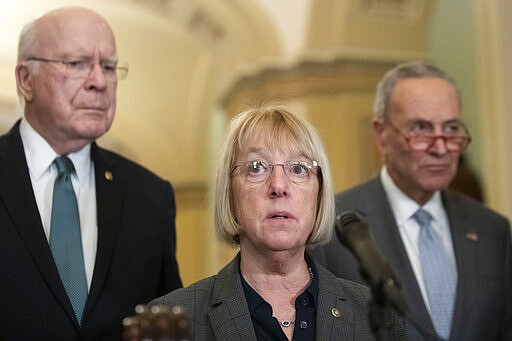 Sen. Patrick Leahy, D-Vt., left, and Senate Minority Leader Chuck Schumer of N.Y., listen as Sen. Patty Murray, D-Wash., speaks about the coronavirus during a media availability on Capitol Hill, Tuesday, March 3, 2020 in Washington. (AP Photo/Alex Brandon)