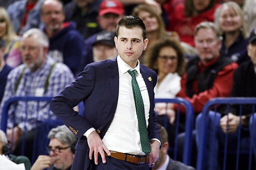 FILE - In this Feb. 20, 2020, file photo, San Francisco head coach Todd Golden looks on during the second half of an NCAA college basketball game against Gonzaga in Spokane, Wash. First-year University of San Francisco coach Golden has impressed his peers and colleagues with his calm on the sideline. He is the seventh-youngest head coach in Division-I after being promoted to guide the Dons when Kyle Smith left for Washington State after last season.&#160;(AP Photo/Young Kwak, File)