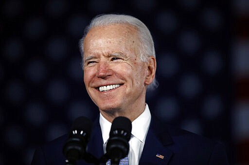 FILE - In this Saturday, Feb. 29, 2020, file photo, Democratic presidential candidate former Vice President Joe Biden speaks at a primary night election rally in Columbia, S.C. Biden looks to turn his decisive win Saturday in South Carolina into momentum for his campaign heading into Super Tuesday. (AP Photo/Matt Rourke, File)