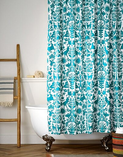 This photo provided by Hygge &amp; West shows the Otomi Shower Curtain in Turquoise. Renters have traditionally been limited in how boldly they can decorate and still get their security deposit back. But new products are making renters' decorating dreams more doable. (Hygge &amp; West via AP)