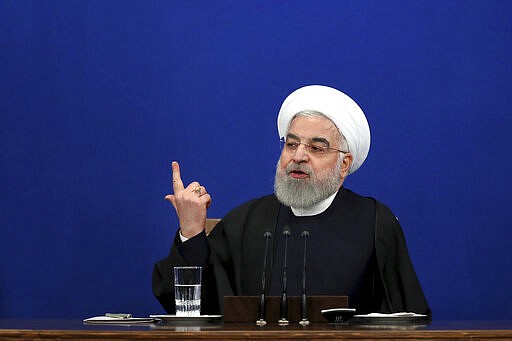 Iran's President Hassan Rouhani gives a press conference in Tehran, Iran, Sunday, Feb. 16, 2020. Rouhani said Sunday  that he doesn't believe the U.S. will pursue war with his country, because it will harm President Donald Trump's 2020 reelection bid. Tensions have been escalating steadily since Trump pulled the U.S. out of Tehran&#146;s 2015 nuclear deal with world powers, and reimposed crippling sanctions on Iran. (AP Photo/Ebrahim Noroozi)