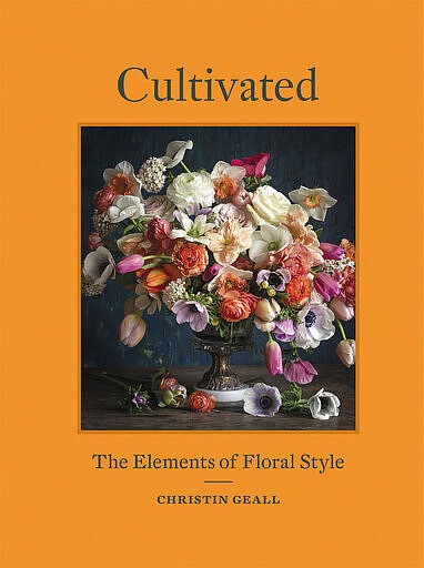 This photo shows the cover of the book "Cultivated: The Elements of Floral Style" by Christin Geall. In lighting fixtures, wallpapers, bedding and wall art, floral design is having a big year in 2020. There's also a renewed interest in flower arranging and floral-inspired table settings. (Princeton Architectural Press via AP)