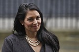 UK's Johnson stands by colleague as bullying claims mount