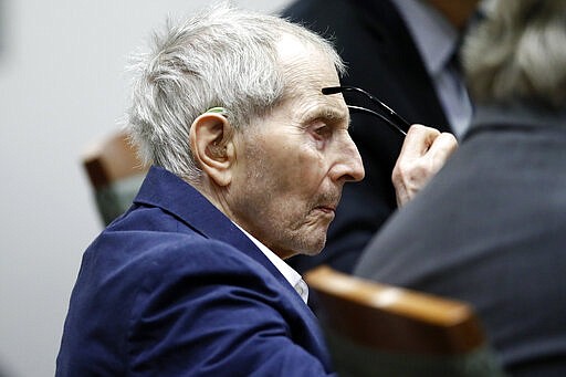 Real estate heir Robert Durst sits during his murder trial at the Airport Branch Courthouse in Los Angeles on Wednesday, March 4, 2020. After a Hollywood film about him, an HBO documentary full of seemingly damning statements, and decades of suspicion, Durst is now on trial for murder. In opening statements Wednesday, prosecutors will argue Durst killed his close friend Susan Berman before New York police could interview her about the 1982 disappearance of Durst's wife. (Etienne Laurent/EPA via AP, Pool)