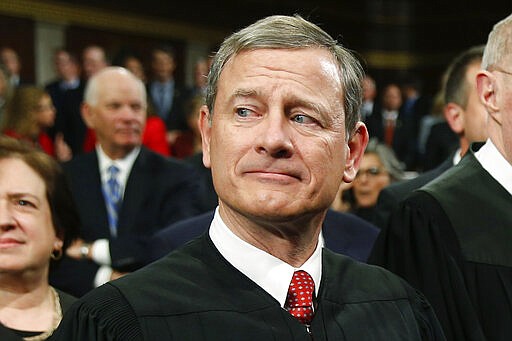 FILE - In this Jan. 12, 2016 file photo, Chief Justice John Roberts arrives for the State of the Union address to a joint session of Congress on Capitol Hill in Washington. Roberts, lately a fixture at the Senate impeachment trial of President Donald Trump, is expected to be among four Supreme Court justices at House of Representatives Tuesday evening for the president&#146;s State of the Union speech. (AP Photo/Evan Vucci)