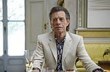 Returning to acting, Jagger plays a man of wealth and taste