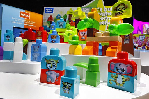 Mega Bloks, by Mattel, are displayed at Toy Fair New York, in the Javits Convention Center, Monday, Feb. 24, 2020. From Baby Yoda to eco-friendly stacking rings, toymakers displayed an array of goods that they hope will be on kids' wish lists for the holiday 2020 season. The four-day Toy Fair comes as the U.S. toy industry has been whipsawed by a number of obstacles.   (AP Photo/Richard Drew)