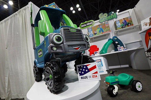 Products in the Go Green line of Little Tikes, from MGA Entertainment, are displayed at Toy Fair New York, in the Javits Convention Center, Monday, Feb. 24, 2020.  From Baby Yoda to eco-friendly stacking rings, toymakers displayed an array of goods that they hope will be on kids' wish lists for the holiday 2020 season. The four-day Toy Fair comes as the U.S. toy industry has been whipsawed by a number of obstacles.   (AP Photo/Richard Drew)