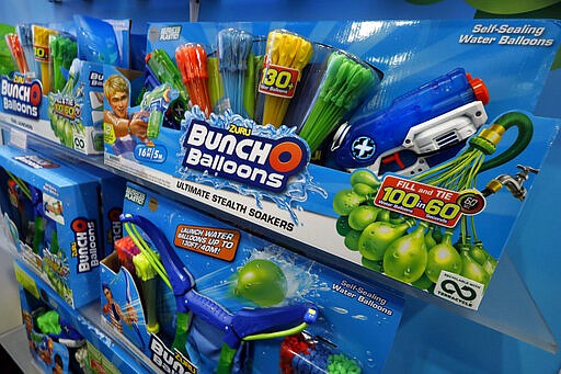 Bunch O Balloons, by Zuru, are displayed at Toy Fair New York, in the Javits Convention Center, Monday, Feb. 24, 2020.  From Baby Yoda to eco-friendly stacking rings, toymakers displayed an array of goods that they hope will be on kids' wish lists for the holiday 2020 season. The four-day Toy Fair comes as the U.S. toy industry has been whipsawed by a number of obstacles.   (AP Photo/Richard Drew)