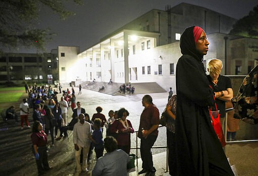 &quot;I can remember when I did not have the right to vote,&quot; said Nancy Glenn Griesinger, second from right, when asked why she waited so long in line to vote Tuesday, March 3, 2020, at Texas Southern University in Houston. After 10 p.m., a line of people still stretched out of the Robert James Terry Library as they waited to cast their votes. (Jon Shapley/Houston Chronicle via AP)